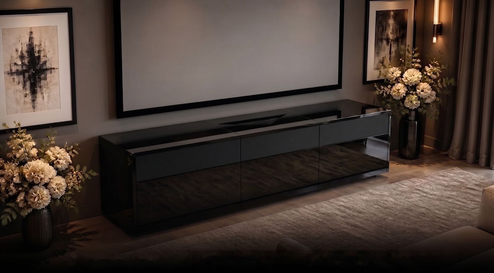 Close-up of a high-gloss black UST credenza with the projector bay beneath a wall screen